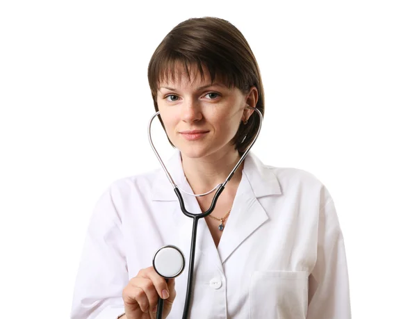 Vrouwelijke arts houden stethoscoop wees naar camera. — Stockfoto