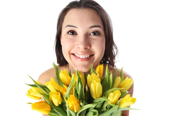 Gelukkige vrouw met bloemen — Stockfoto