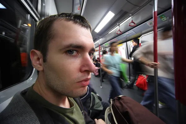 Man in metro auto — Stockfoto