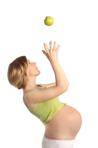 Femme enceinte avec pomme — Photo