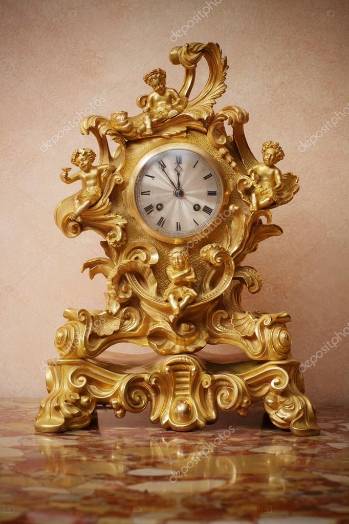 Vintage golden clock. — Stock Photo © logoboom 32420095
