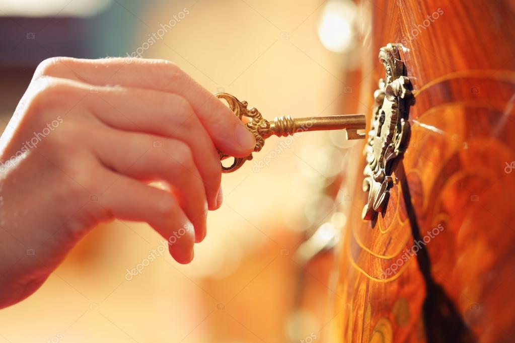 Hand with key — Stock Photo © logoboom 32420141