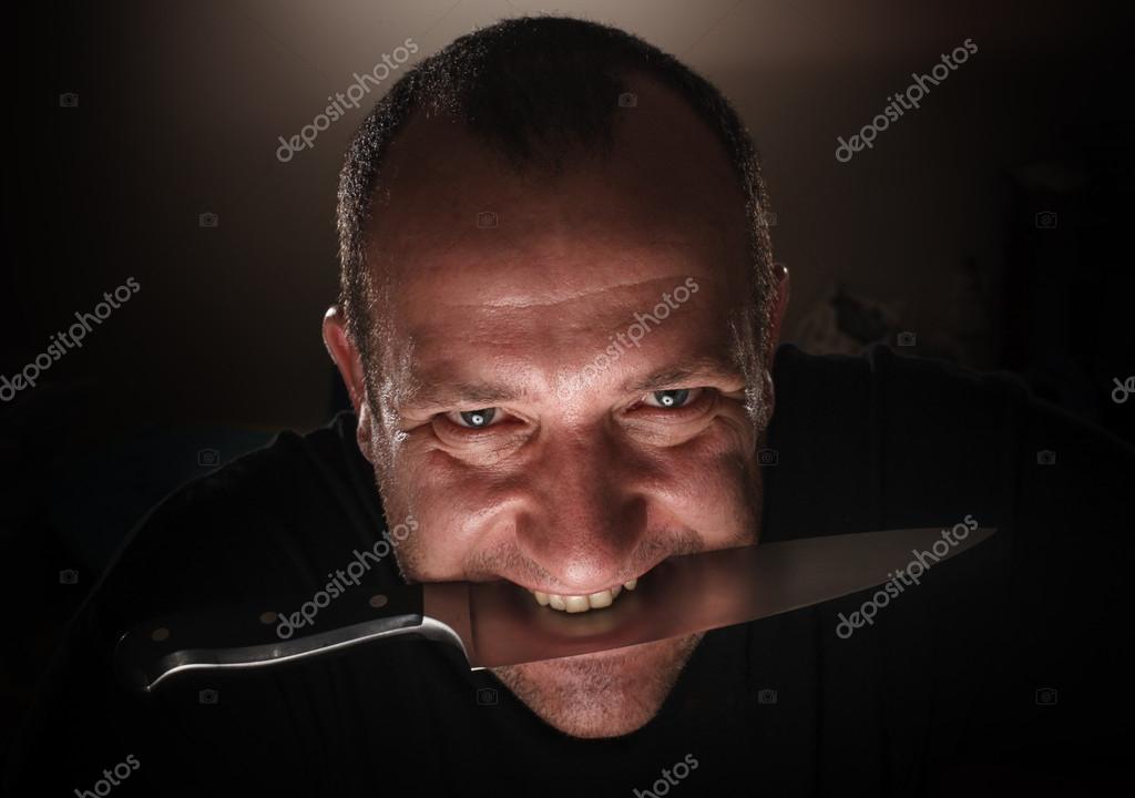 Man with knife Stock Photo by ©logoboom 32426767