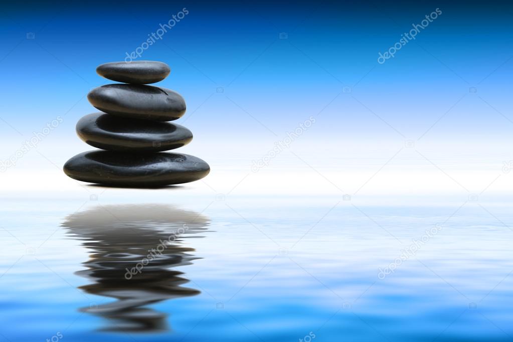 Zen stones over water