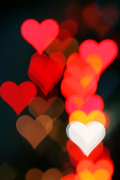 Background with heart-shaped highlights. — Stock Photo, Image