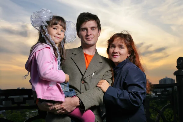 Young happy family with child — Stock Photo, Image