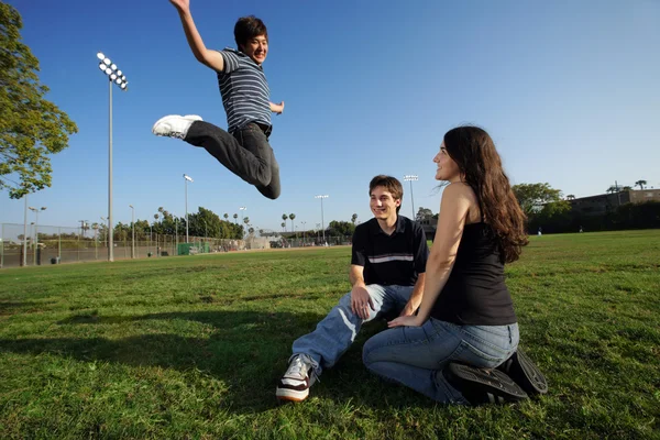 Three young friends outdoors — Stock Photo, Image