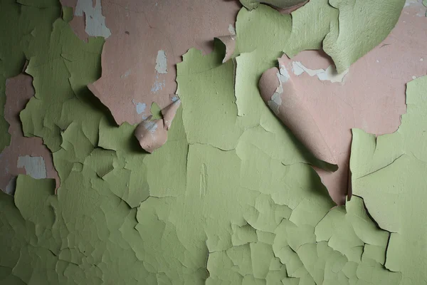 Old paint peeling from wall — Stock Photo, Image