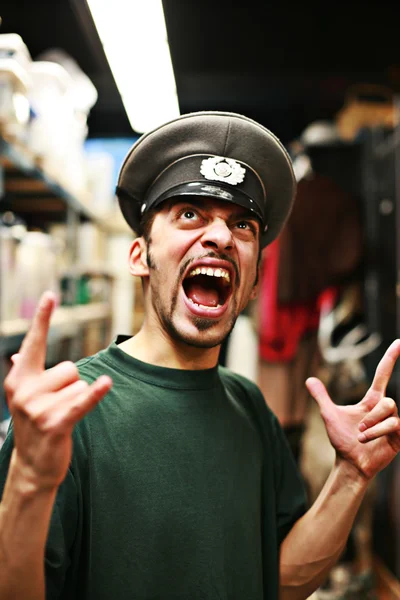 Man in military service cap shouting — Stock Photo, Image