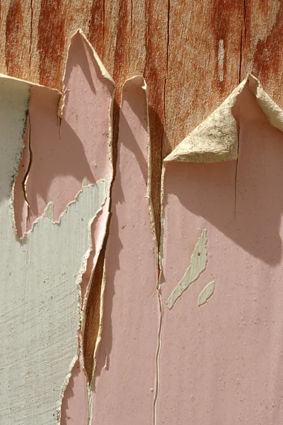 Peeling paint over wooden wall — Stock Photo, Image