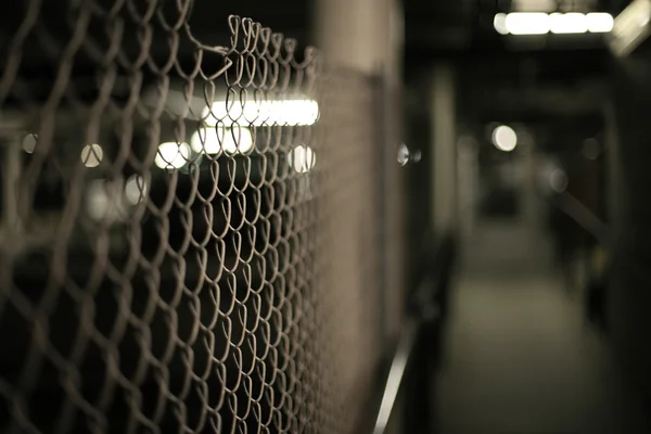 Fence in an underground garage structure — Stock Photo, Image