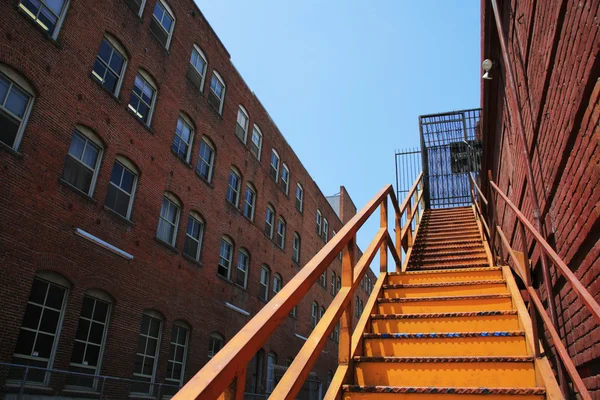 Stairway going up in an old downtown building — Stock Photo, Image