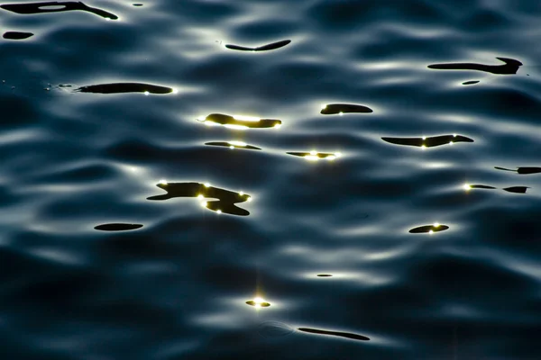 Dark water reflections — Stock Photo, Image