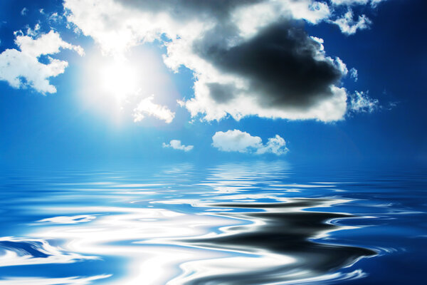 Clouds and sun reflecting in the water.