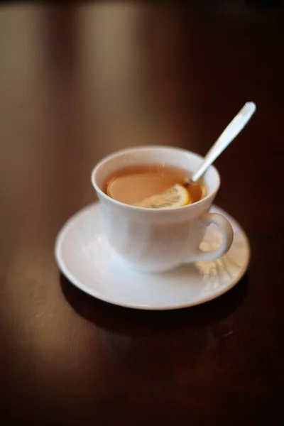 Cup of tea with lemon Stock Picture