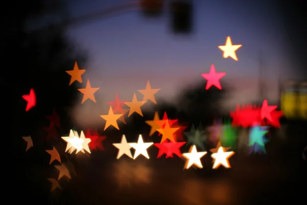 Blurred background with star-shaped highlights. — Stock Photo, Image