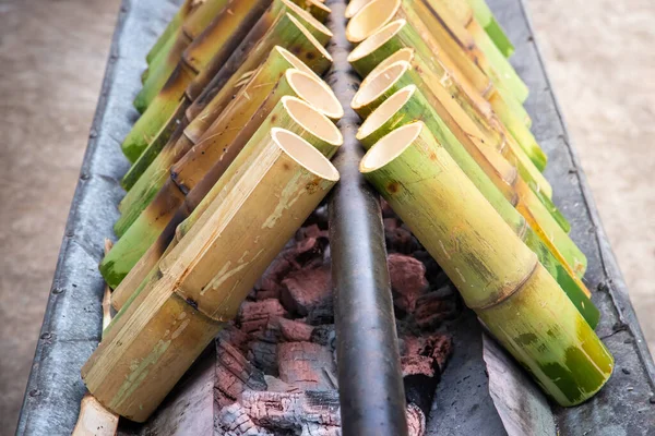Sticky rice cooked in a bamboo tube by adding coconut milk and then burning until cooked,Khao Lam is popular with Thai people