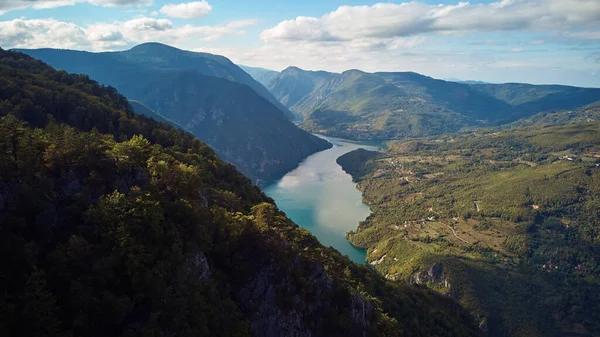 Drone aerial footage of river Drina and Tara mountain landscape.