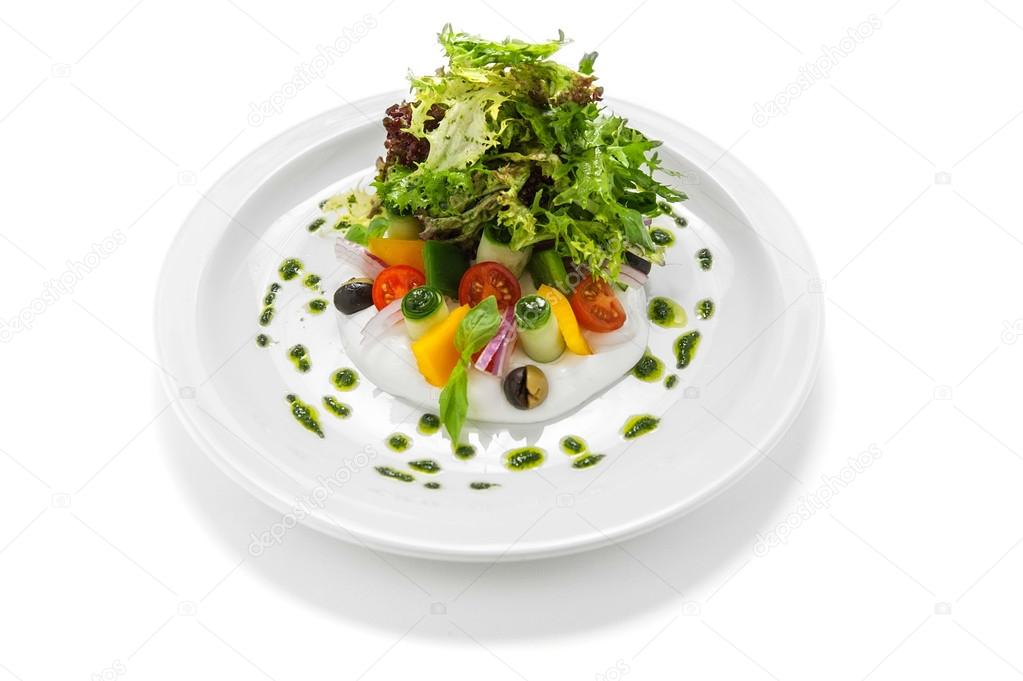 Greek salad on a white plate