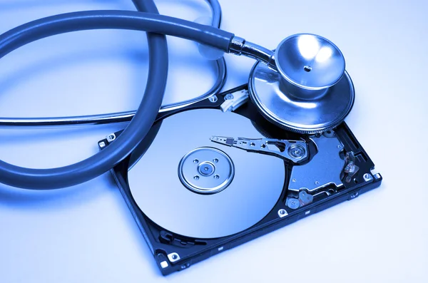 Hard drive. Stethoscope — Stock Photo, Image