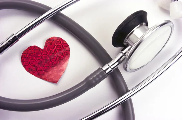 Stethoscope with paper heart — Stock Photo, Image