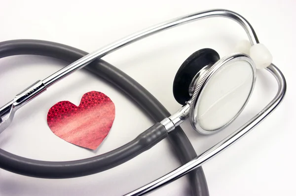 Stethoscope with paper heart — Stock Photo, Image