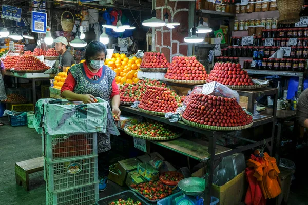Baguio, Philippines - August 2022: Strawberry stand in Baguio market on August 4, 2022 in Baguio, Luzon, Philippines.