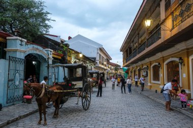 Vigan, Philippines - August 2022: Views of Crisologo street in Vigan, it is a UNESCO World Heritage Site and it is one of the few Spanish colonial towns left in the Philippines on August 6, 2022 in Vigan, Luzon, Philippines.