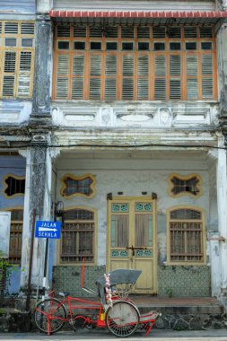 George Town, Malezya - Ekim 2022: George Town 'da 11 Ekim 2022' de Malezya 'nın Penang Adası' nda park edilmiş üç tekerlekli bisiklet