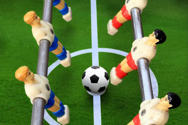 Close up shot of soccer table game with green grass field — Stock Photo, Image