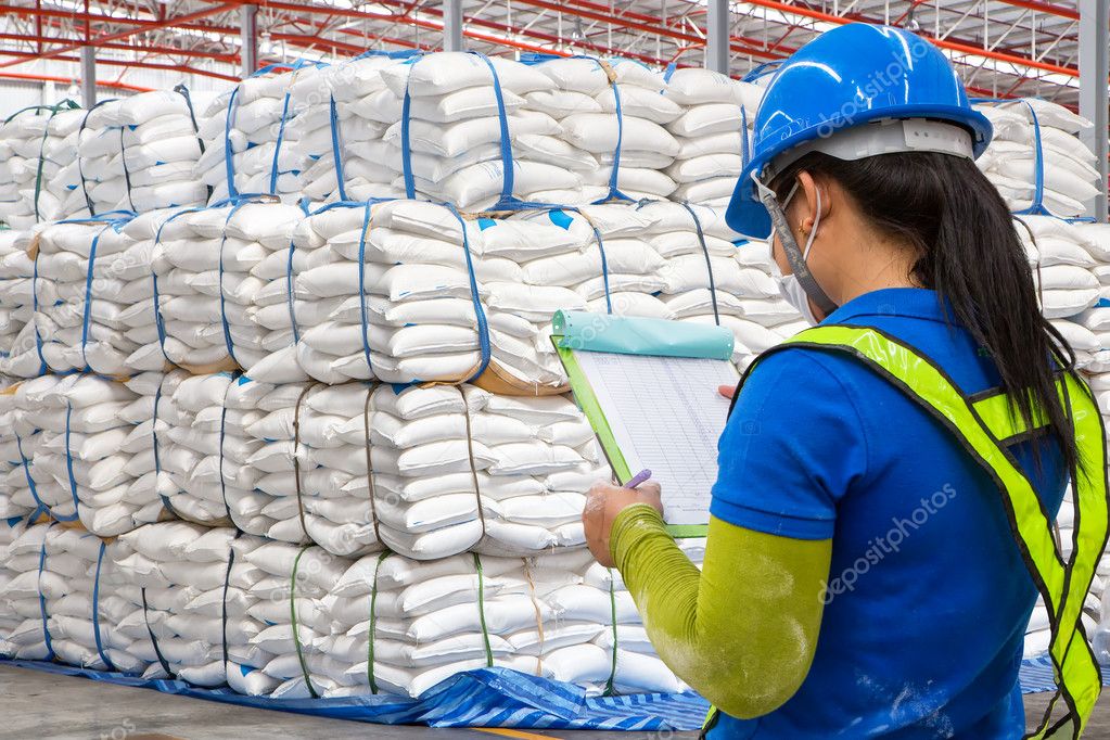 stacked sacks of meal in warehouse waiting for transportation