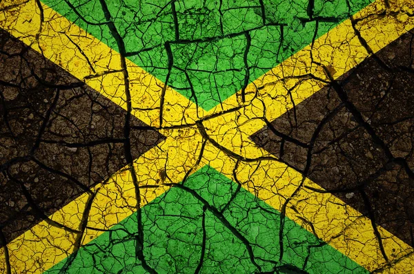 ジャマイカの国旗に乾燥した土壌パターン 干ばつの概念を持つ国 水問題だ 乾燥した地球の国 — ストック写真
