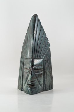 şaman yeşil mermer bir yüz zanaat. Ekvator kültür bir gelenek. s