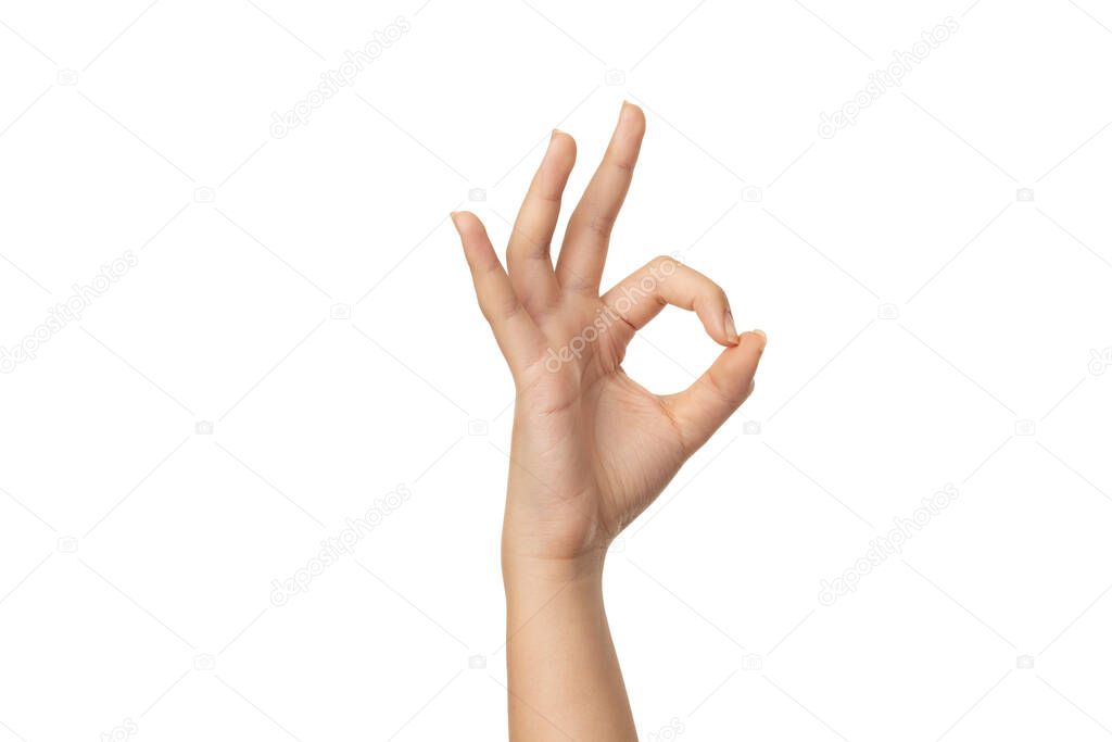 Woman hand ok sign on a white isolated background with clipping path