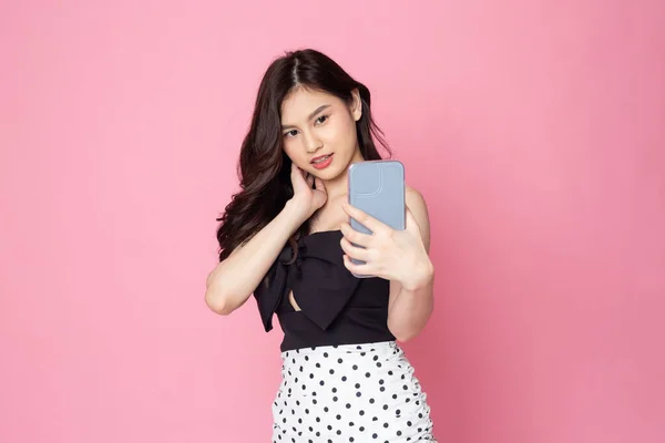 Portrait Asian Young Women Happy While Using Smartphone Isolated Pink — 图库照片