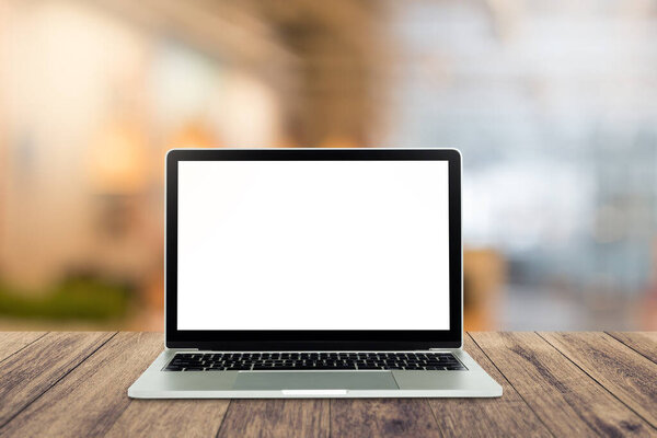 Computer mockup white background on wooden table. Laptop with blank screen