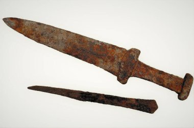 Scythian sword-akinak, Scythian dagger of the early Iron Age III-V centuries. BC. and a knife on a white background, an ancient Scythian dagger-akinak