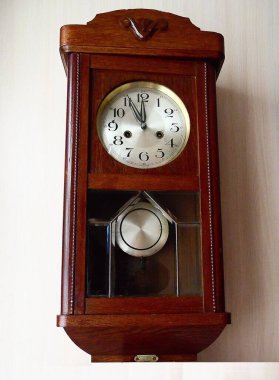Antique clock, Germany. , the hands of the old chimes show almost 12 hours