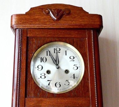 Antique clock, Germany. , the hands of the old chimes show almost 12 hours