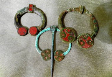 Antique bronze jewelry: brooches with enamels of the 3-5th century A.D. Eastern Europe. Kiev culture