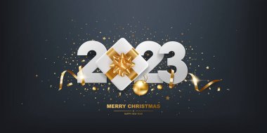 Happy New Year 2023. White paper numbers with golden ribbons, gift box and confetti on a black background.