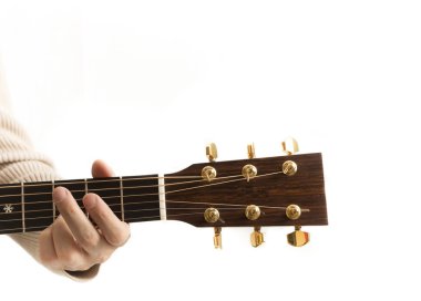Close-up headstock of an acoustic guitar clipart