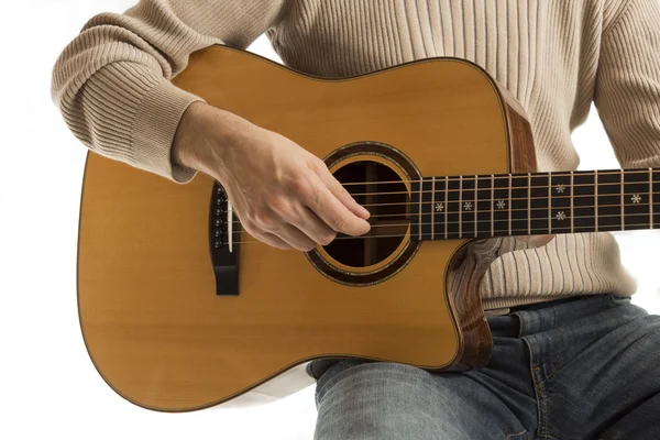 Musician playing an acoustic guitar — Stock Photo, Image
