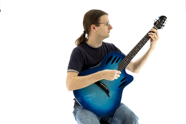 Guitarist playing an electroacoustic guitar, front view — Stock Photo, Image