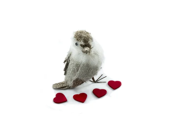 Bird and small hearts around it — Stock Photo, Image