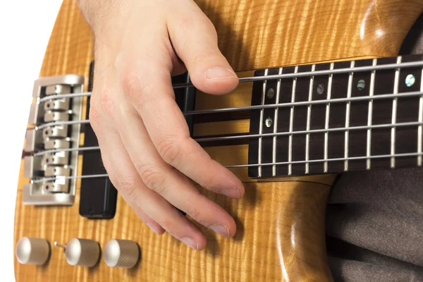 ベースギターに手のクローズ アップ — ストック写真