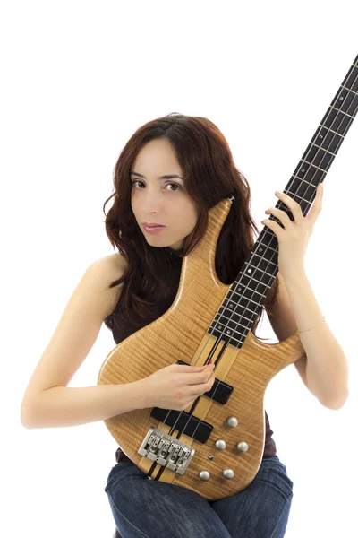 Žena drží její basová kytara — Stock fotografie
