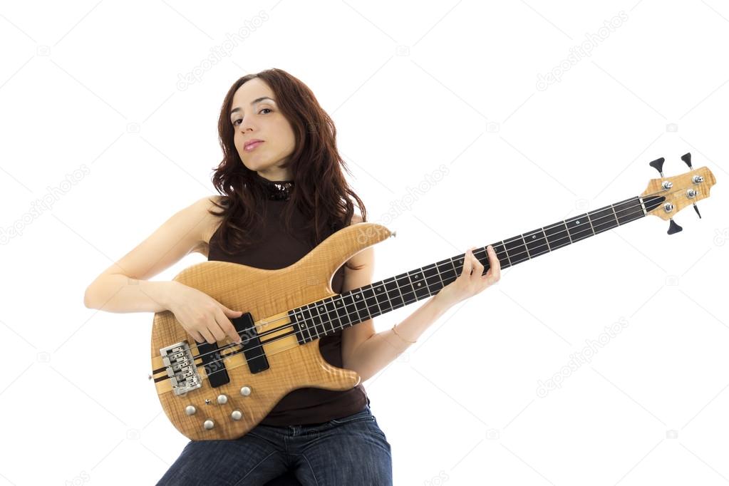 Young woman playing a bass guitar