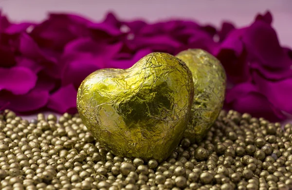 Two golden hearts — Stock Photo, Image