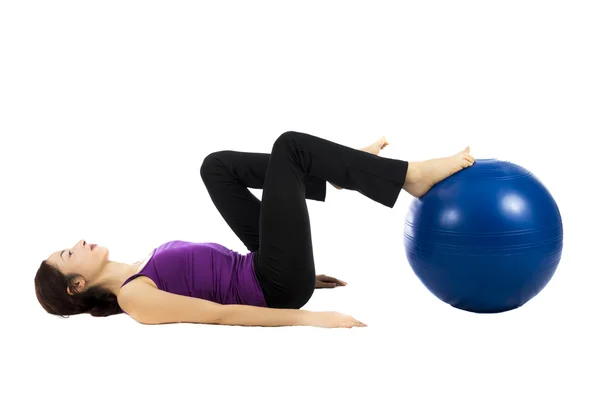 Mulher fazendo exercícios pilates perna — Fotografia de Stock